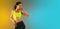 Fashion portrait of young fit and sportive woman on gradient background. Perfect body ready for summertime. Flyer with