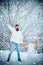 Fashion portrait of young model man indoors with Christmas snowman. Christmas preparation - funny bearded man make