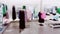 Fashion, retail and shop, blurred interior view of apparel clothing store in luxury shopping mall as defocused