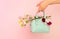 Fashion spring accessories - mint handbag purse and heart shaped sunglasses on pastel pink