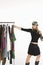 Fashion stylist with clothes rail