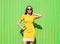 Fashion summer portrait of beautiful young woman in yellow dress