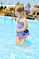 Fashion toddler in the pool