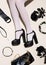 Fashion unrecognizable legs in white tights and black Lady shoes. Gothic accessories. Details flat lay style.  Retro Lady