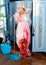 Fashion vintage blond housewife cleaning