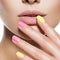 Fashion woman with beautiful multicolored nails