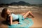 Fashion Woman In Blue Dress Lying On Sand Tropical B