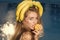 Fashion woman model posing. Woman relax in swimming pool with lemon. Vitamin in banana at girl near water. Dieting and