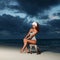 Fashion woman sit on the beach sunset background. Happy lifestyle. White sand, dawn cloudy sky and blue sea of tropical beach.