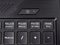 Fashionable backlit laptop keyboard on dark background