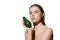 Fashionable. Beautiful young woman with fresh avocado over white background. Cosmetics and makeup, natural and eco