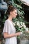 fashionable bride posing in white dress