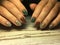 Fashionable brown manicure on short nails with gray and green