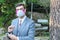 Fashionable businessman wearing eccentric breathing mask