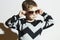 Fashionable child in sunglasses and sweater.Little boy.Kids fashion