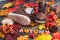 Fashionable children`s shoes. Boots for a little boy. Winter, autumn collection. Autumn leaves. The word AUTUMN is made up of