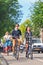 Fashionable couple on bicycles, Amsterdam, Netherlands.