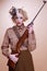 Fashionable Girl Scout Holding Rifle