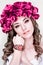 Fashionable,glamorous,unreal beautiful,attractive model,girl with wreath with rose,red flowers,white,pale skin,creative make-up.