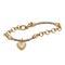 Fashionable golden bracelet with heart shape pendant