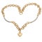 Fashionable golden necklace with heart shape pendant