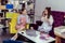 Fashionable good-looking ladies sitting in chilling area of bookshop