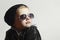 Fashionable little boy in sunglasses.Child.Winter style.Kids fashion