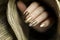 Fashionable manicure with a matte Golden color of nail Polish