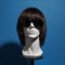 Fashionable Mannequin Heads With Circular Sunglasses And Brunette Wigs