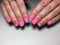 fashionable matte pink manicure with abstraction