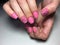 fashionable matte pink manicure with abstraction