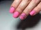 fashionable matte pink manicure with abstraction