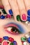 Fashionable multi-colored manicure short nails and makeup