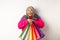 Fashionable senior asian woman shopaholic, hugging shopping bags and smiling joyful, buying with discounts, standing