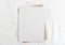 Fashionable stock stationery background - white card for writing on a white table. Wedding feminine background.
