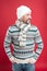 Fashionable wear for chilly season. Happy man in fashionable winter style red background. Mature man smile in