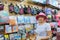 Fashionable woman in pink hat enjoying shopping. Attractive girl