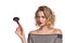 Fashionable woman stylist standing posing with makeup brush