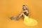 Fashionable woman in trendy yellow dress, shoes and accessories. Fashion spring summer photo. Country girl - Image