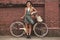 Fashionable woman with vintage bike