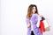 Fashionista buy clothes on black friday. Girl makeup furry violet vest shopping white background. Shopping and gifts