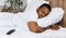 Fast Asleep Black Man Sleeping Embracing Pillow Resting At Home