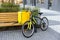 Fast bicycle courier. big yellow bag and bicycle