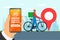 Fast bicycle delivery ordering service app concept. Hand holding smartphone with geotag gps location pin on city street