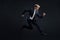 Fast business. Running businessman in business suits, concept