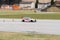 Fast car during a test race on the local airfield in Ambri in Switzerland