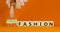Fast or ethical fashion symbol. Concept words Fast fashion and Ethical fashion on wooden cubes. Businessman hand. Beautiful orange