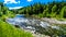 The fast flowing water of the Coldwater River near the intersection between the Coldwater Road and the Coquihalla Highway