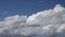 Fast flying cumulus clouds against the blue sky. time lapse