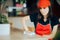 Fast Food Employee Cleaning Tables in a Restaurant